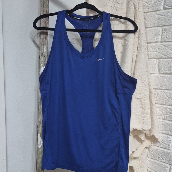 Nike Tops - Nike Relaxed Blue Tank Top for Effortless Style